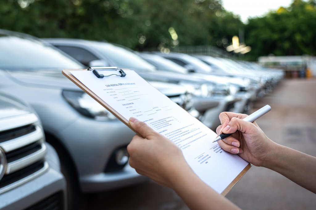 Action of a customer is signing on the agreement term of car ren